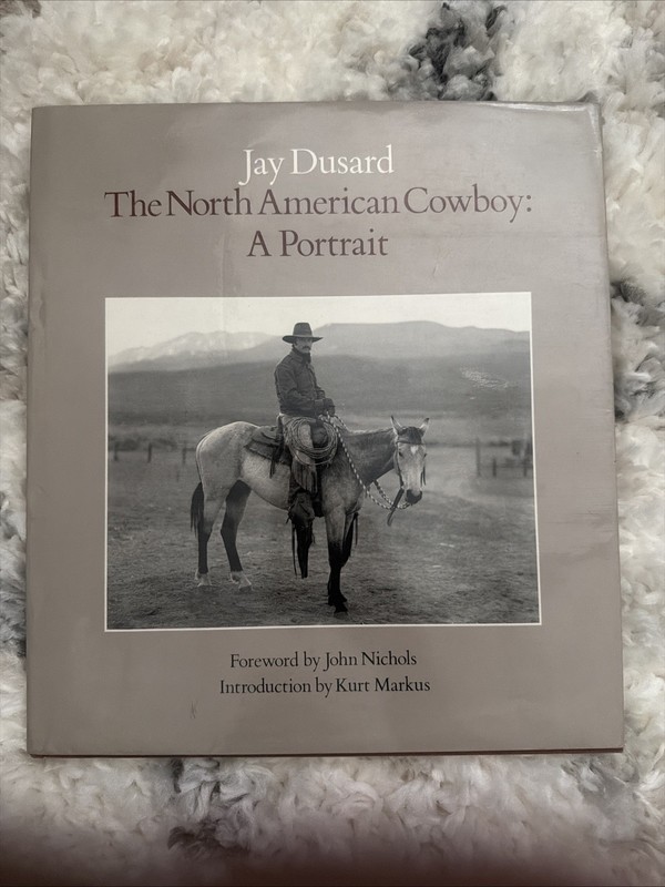 THE NORTH AMERICAN COWBOY: A PORTRAIT by Dusard, Jay. 1983 1st edition, DJ.