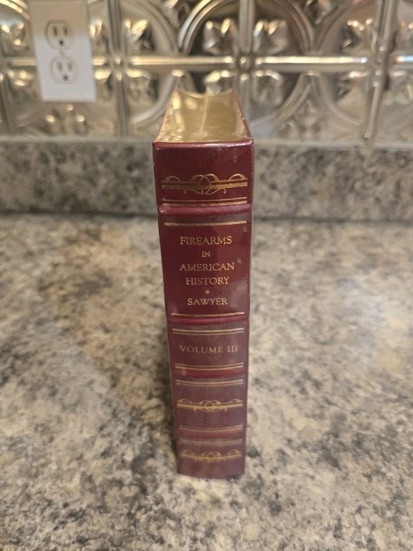 New & Sealed Firearms In American History Sawyer Volume III Red/22 Kt Gold gallery