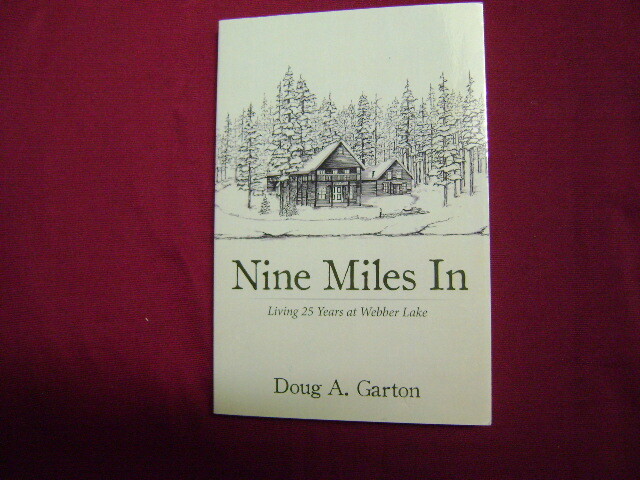 Garton, Doug A. Nine Miles In. Living 25 Years at Webber Lake. Inscribed by the