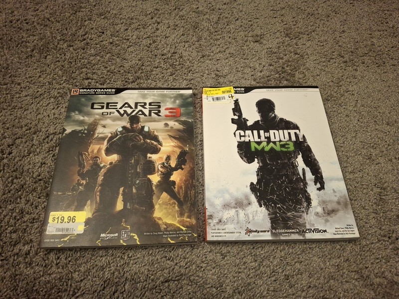 Lot of 9 Video Game Strategy Guides Spider-Man, Twisted Metal, Halo, COD, 007 gallery