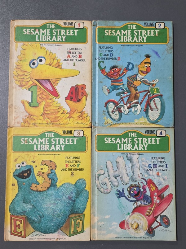 The Sesame Street Library hardcover volumes 1,2,3, and 4 (Lot of 4)