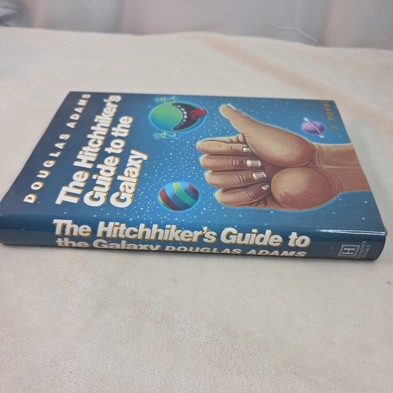 The Hitchhiker's Guide to the Galaxy Douglas Adams 1st Edition/1st Reprint HCDJ gallery