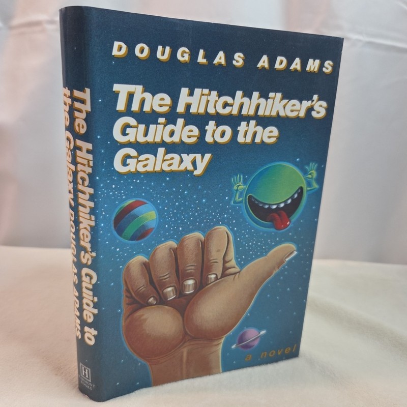The Hitchhiker’s Guide to the Galaxy Douglas Adams 1st Edition/1st Reprint HCDJ