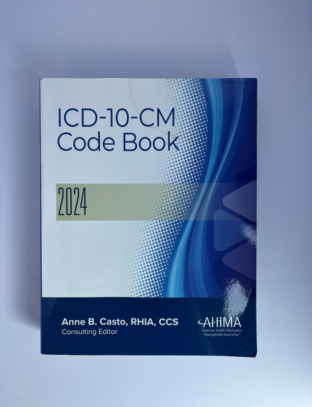 ICD-10-CM Code Book 2024 by Anne Casto (2024, Trade Paperback)