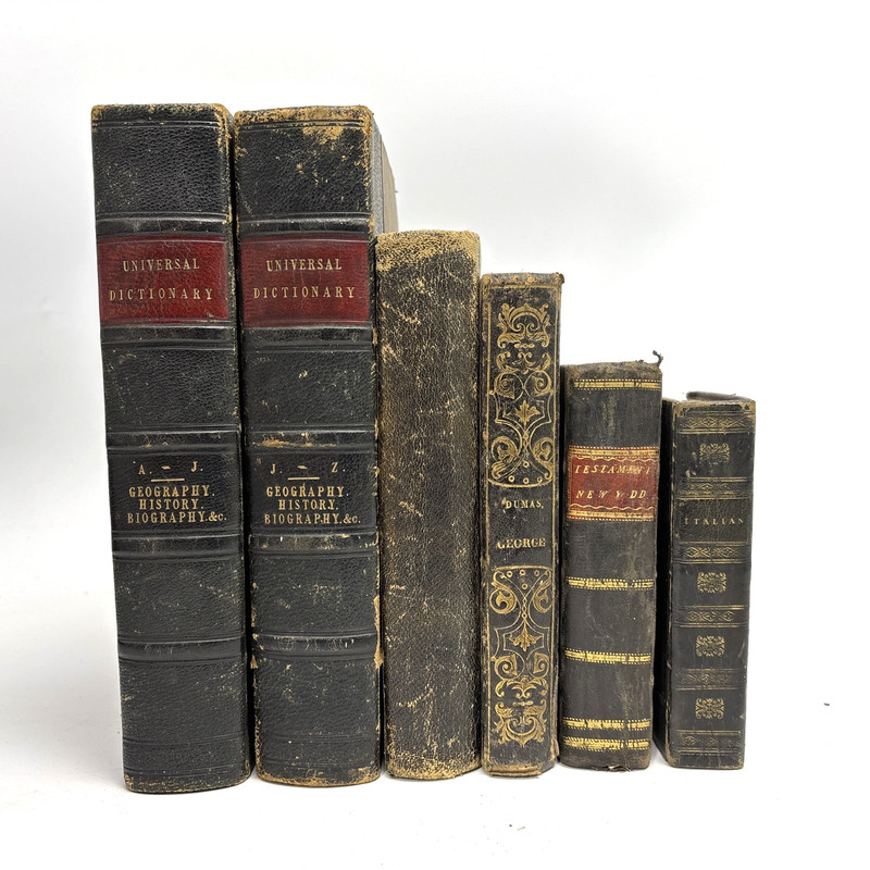 Damaged Old Books with Leather Spines for Decoration. 21cm shelf space.