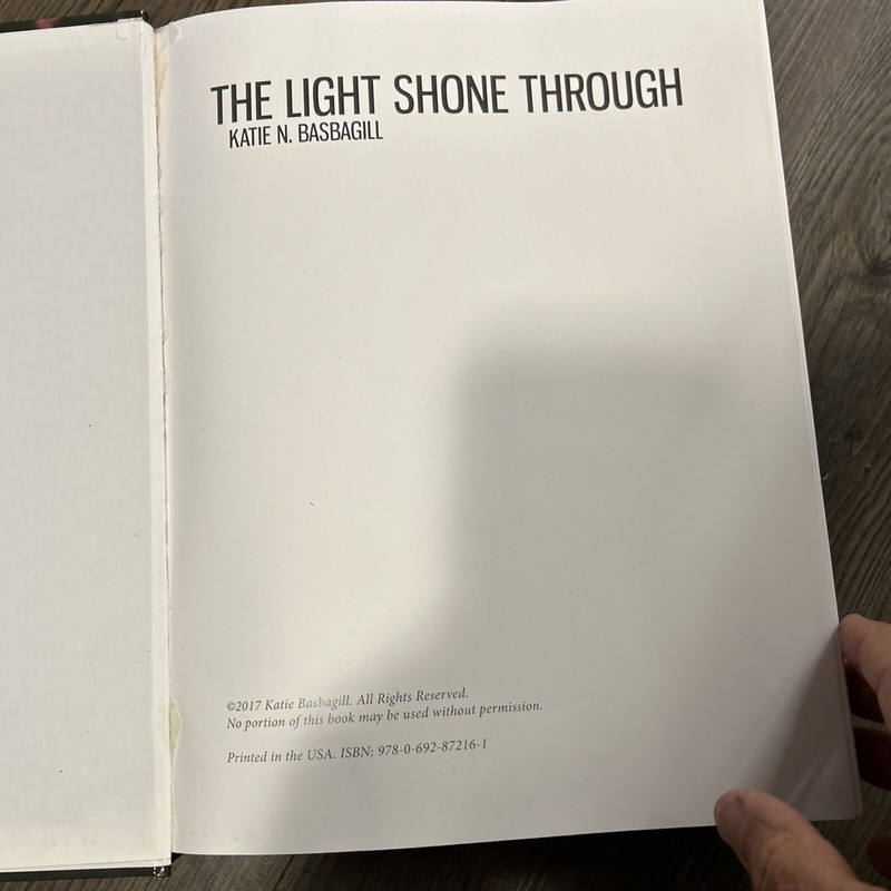 The Light Shone Through Katie N Babagill 2017 Hardcover 484 pages Africa photos gallery