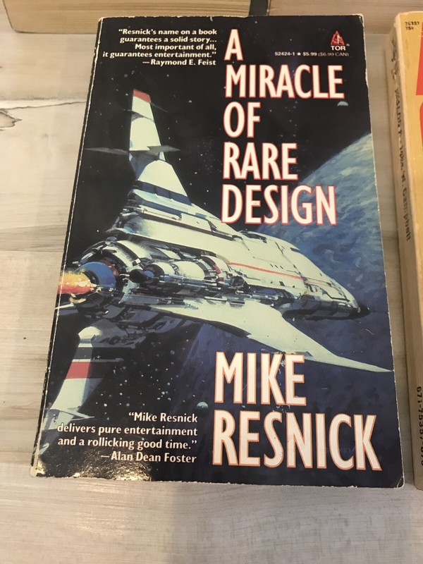 Mixed Lot Of 7 Sci Fi- Anderson- Viehl- Resnick- Campbell- Cook- Anthony- Aldrin gallery