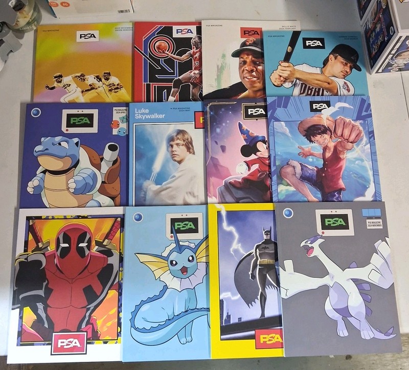 12x PSA Magazine Lot; Sports Vol. 24-27; TCG Vol. 1-8; Blastoise Luffy Mickey
