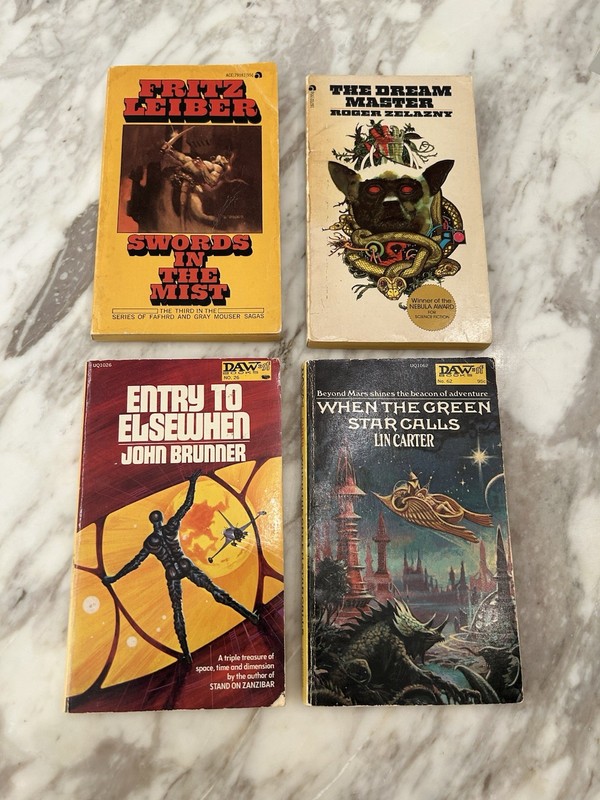 Lot of 4 Vintage Pulp Paper Back Sci Fi Fantasy Books