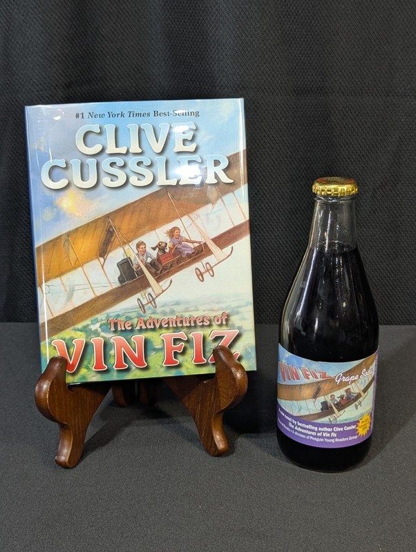 RARE Clive Cussler Signed Adventures of Vin Fiz Book & Promo Soda Bottle Set