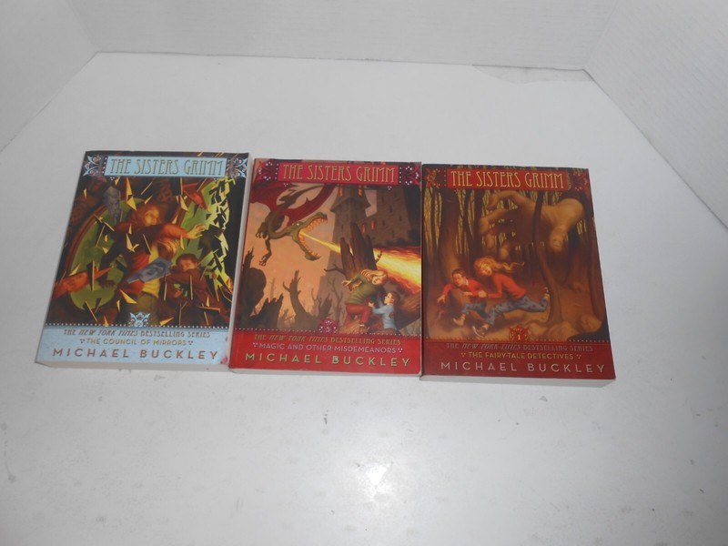 3 books in The Sister Grimm Series by Michael Buckley vol.1,5,9