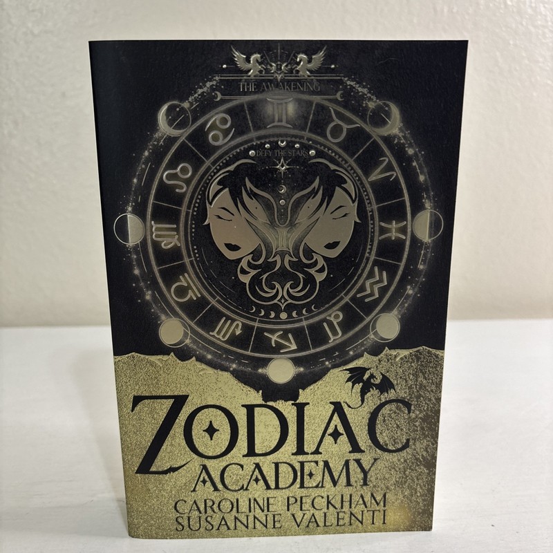 Zodiac Academy 1: the Awakening by Susanne Valenti and Caroline Peckham…