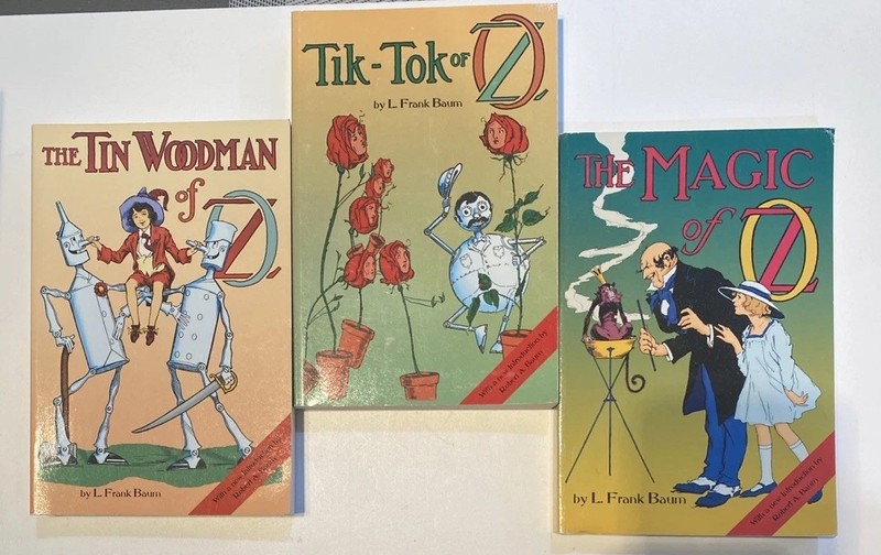 Lot of 3 L. Frank Baum Wizard of Oz paperback books. Very Good Condition