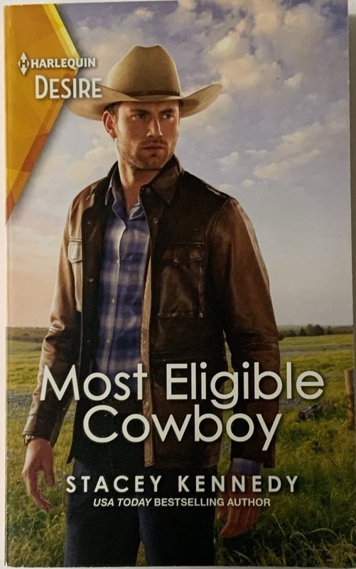 Most Eligible Cowboy : A Western Fake Relationship Romance by Stacey Kennedy