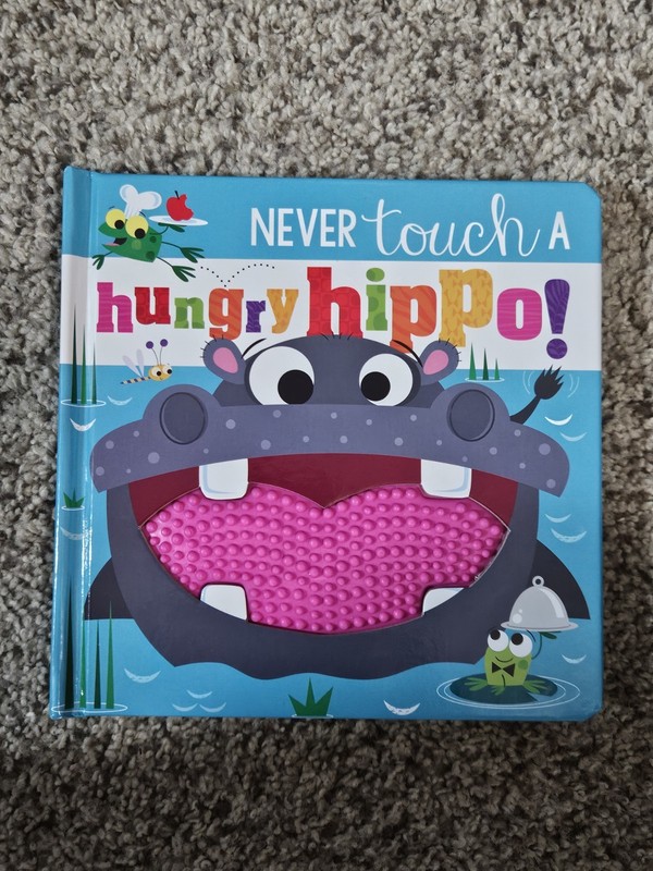 Never Touch a Hungry Hippo! by Rosie Greening (2022, Children’s Board Books)