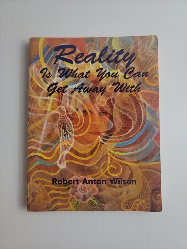 Reality Is What You Can Get Away With – Paperback – Robert Anton Wilson