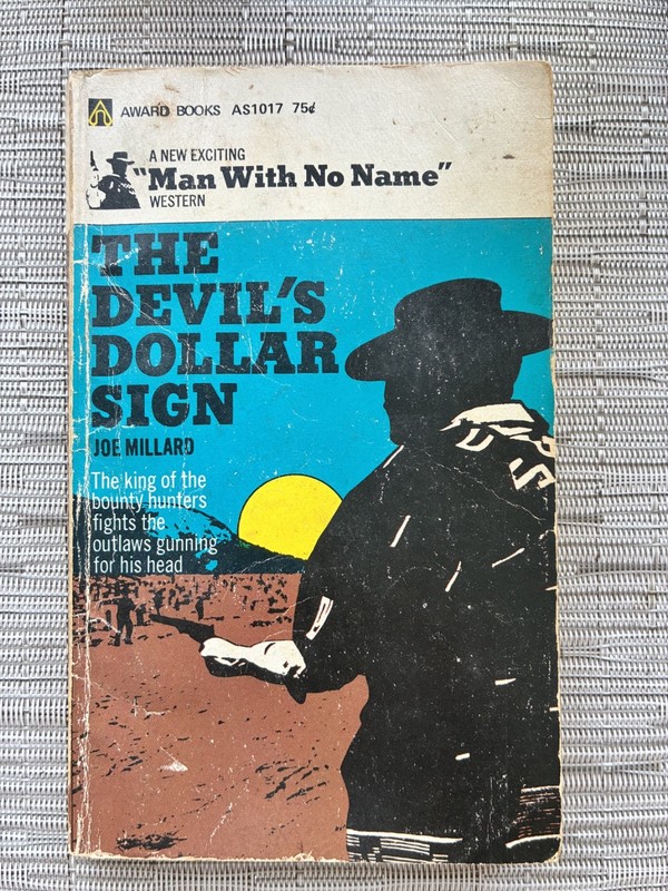 The Devil’s Dollar Sign (Man With No Name) /Joe Millard (#AS1017)